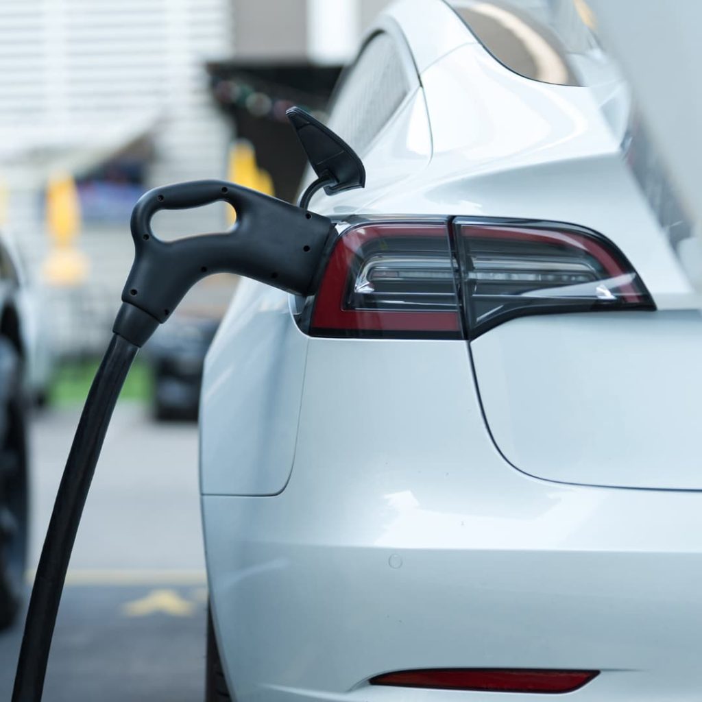 electric vehicle plugged in to charger.
