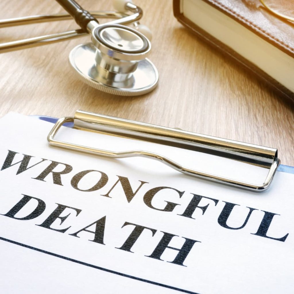 file titled "wrongful death" on a clipboard