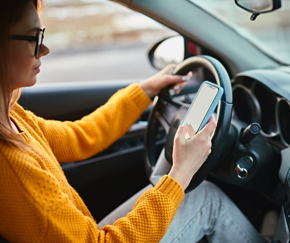 distracted driver looking at phone
